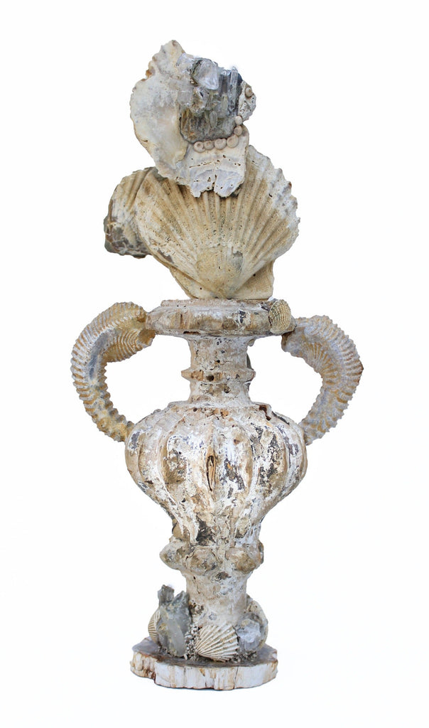 17th or 18th century Italian fragment vase with Chesapecten shells, zig zag oyster fossil arms, fossil shells, and a baroque pearl on a polished petrified wood base.