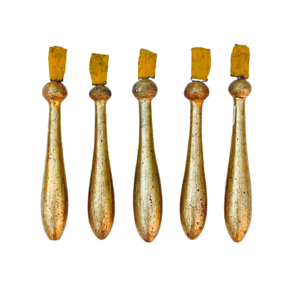 18th century Italian gold leaf church tassels with original gold trim. The tassels originally came from an Italian church and were used during feast days. They are hand-carved and hand-painted. Can be configured into holiday ornaments and decorations to recreate a Rococo-style Christmas or sold to adorn chandeliers.