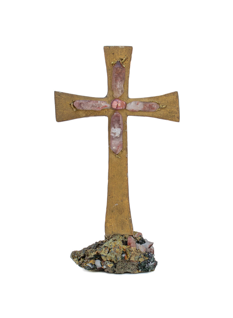 18th century Italian mecca crucifix with red phantom crystal quartz points, natural-forming casting metal, and a baroque pearl. It is sitting on a pyrite in matrix with red phantom crystal quartz points.