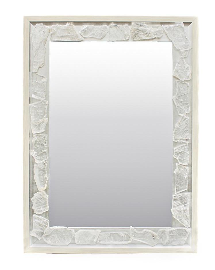 Mirror decorated with selenite slices and chalcedony rosettes.