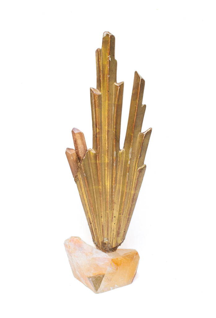 18th century Italian gold sunray fragment with tangerine crystal quartz points on a polished optical calcite base. The hand-carved, hand-painted wood fragment was once a sunray in an angelic, heavenly depiction or halo motif in an Italian church.