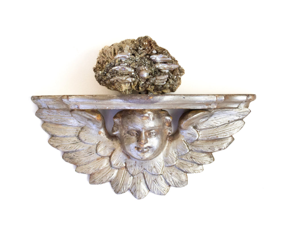 18th century Italian silver leaf angel wall bracket mounted with mica and pyrite in matrix and baroque pearls.