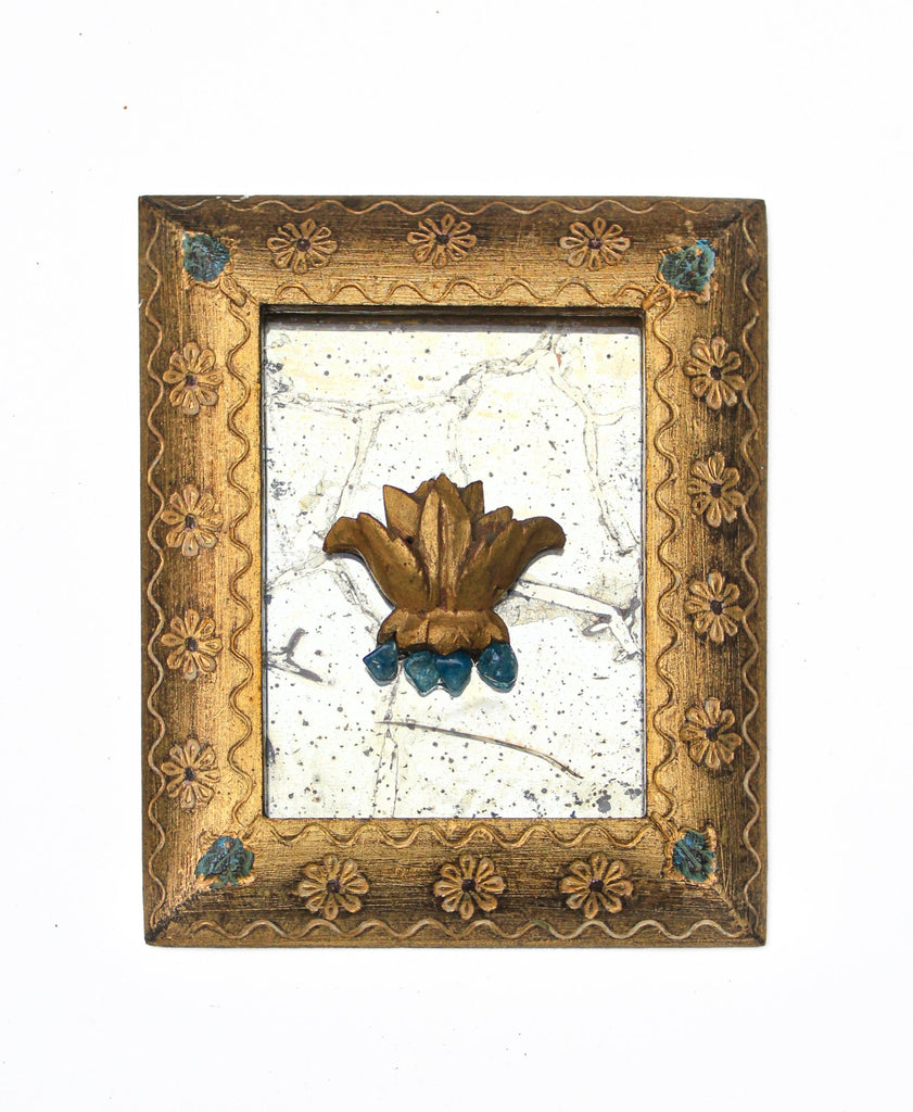 Vintage gold gilded Florentine frame on antique mercury mirror glass with an 18th century Italian fragment and decorated with coordinating polished turquoise. 