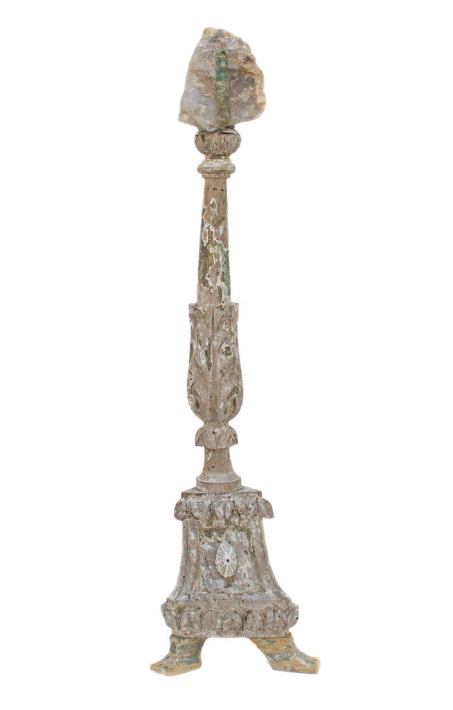 17th century Italian candlestick with aquamarine. The candlestick is from originally from a church in Florence. It hand-carved and hand-painted with hints of pale greenish-hues showing through. The aquamarine in matrix is mounted on top and perfectly coordinates with the candlestick. A shell is placed near the base and an aquamarine point replaces a missing third leg of the artifact.