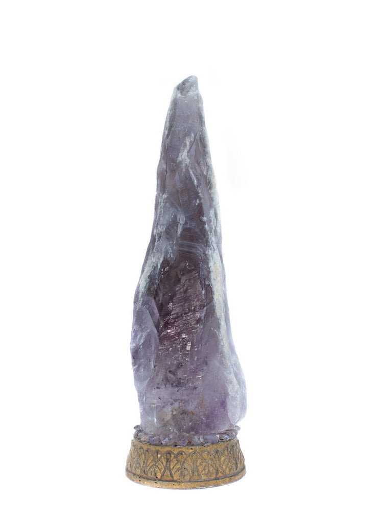 Amethyst root surrounded by amethyst points on an 18th century Italian base.
