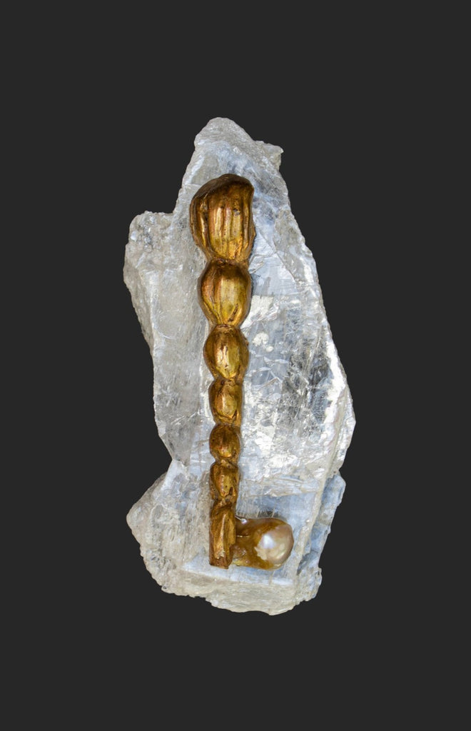 18th century Italian gold leaf fragment with a natural-forming baroque pearl on a selenite slab.