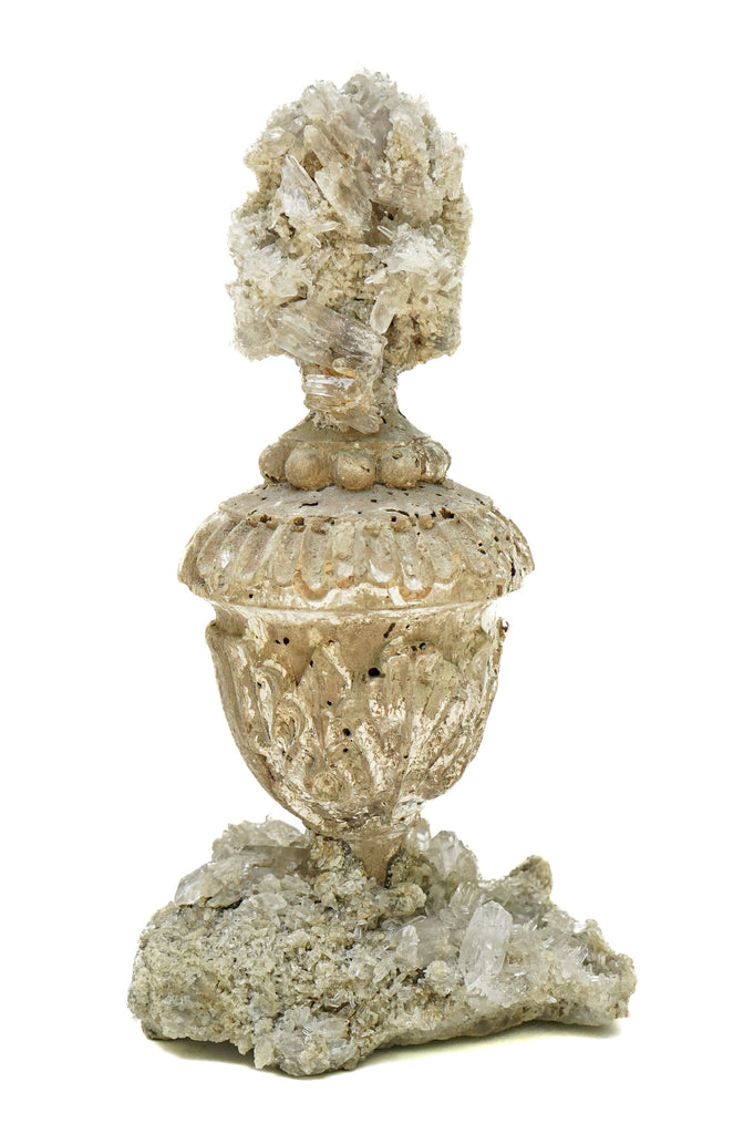 17th century Italian vase with a crystal quartz cluster on a crystal quartz cluster base.
